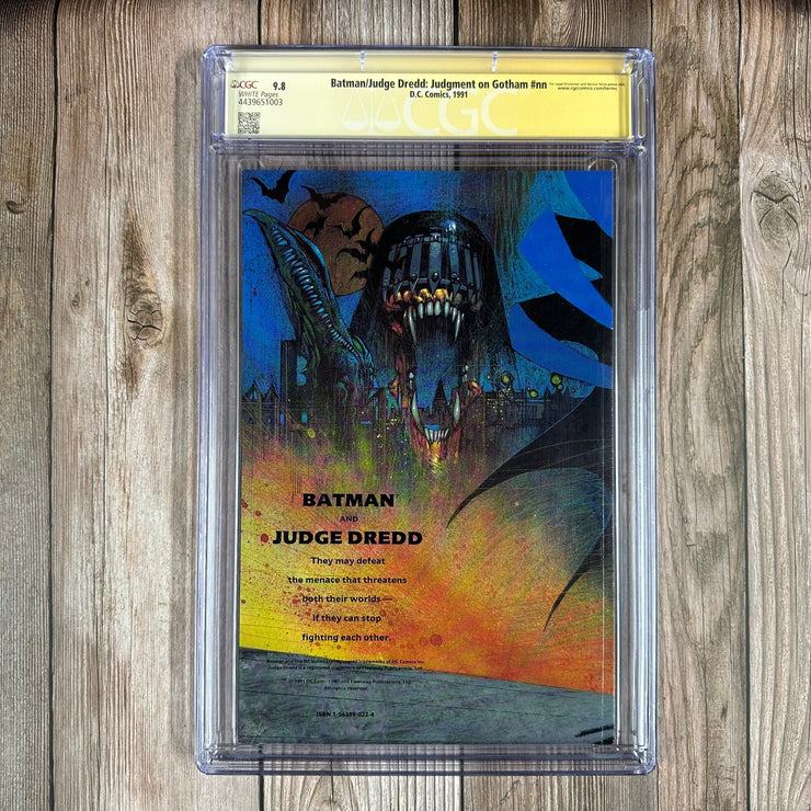 Bry's Comics Batman/Judge Dredd: Judgment on Gotham #nn CGC 9.8 WP SS Signed by Simon Bisley Wraparound Cover, The first of four Batman/Dredd stories (cert:1003)
