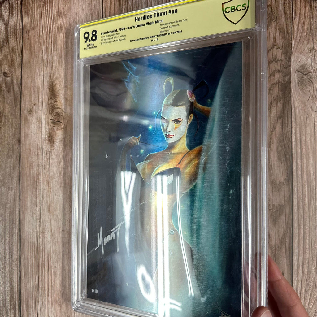Bry's Comics Hardlee Thinn #nn CBCS 9.8 WP Witnessed Signature by Marat Mychaels, 1st Appearance of Hardlee Thinn & Deadpooh, Izzy’s Comics Virgin Metal Edition (Cert: 0004)